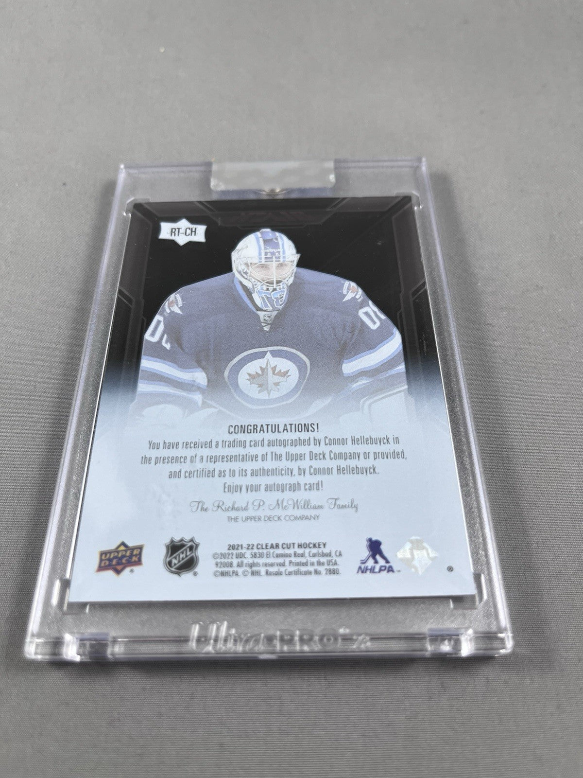2021-22 Upper Deck Clear Cut Connor Hellebuyck Lustrous Rookies Auto Blue Ink