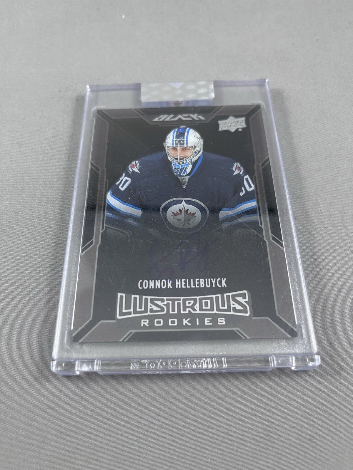 2021-22 Upper Deck Clear Cut Connor Hellebuyck Lustrous Rookies Auto Blue Ink